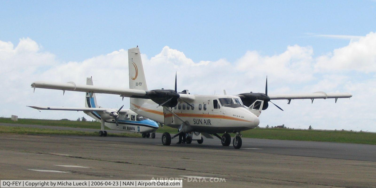 DQ-FEY, 1968 De Havilland Canada DHC-6-100 Twin Otter C/N 87, Sun Air's Twin Otter FEY at its base in Nadi. DQ-FHG of Air Wakaya in the background