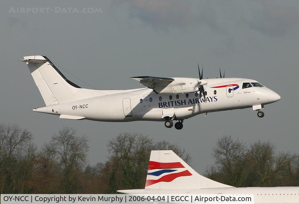 OY-NCC, 1997 Dornier 328-100 C/N 3083, Sun Air of Scandinavia in BA colours passing over MAN's Concorde.