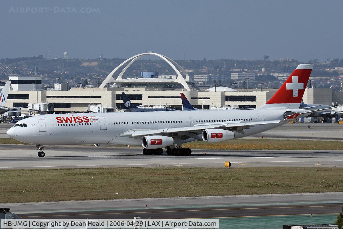 HB-JMG, 2003 Airbus A340-313 C/N 562, Swiss International Airlines HB-JMG (FLT SWR40) exitting RWY 25L onto Taxiway Tango after arrival from Zurich (LSZH), Switzerland.