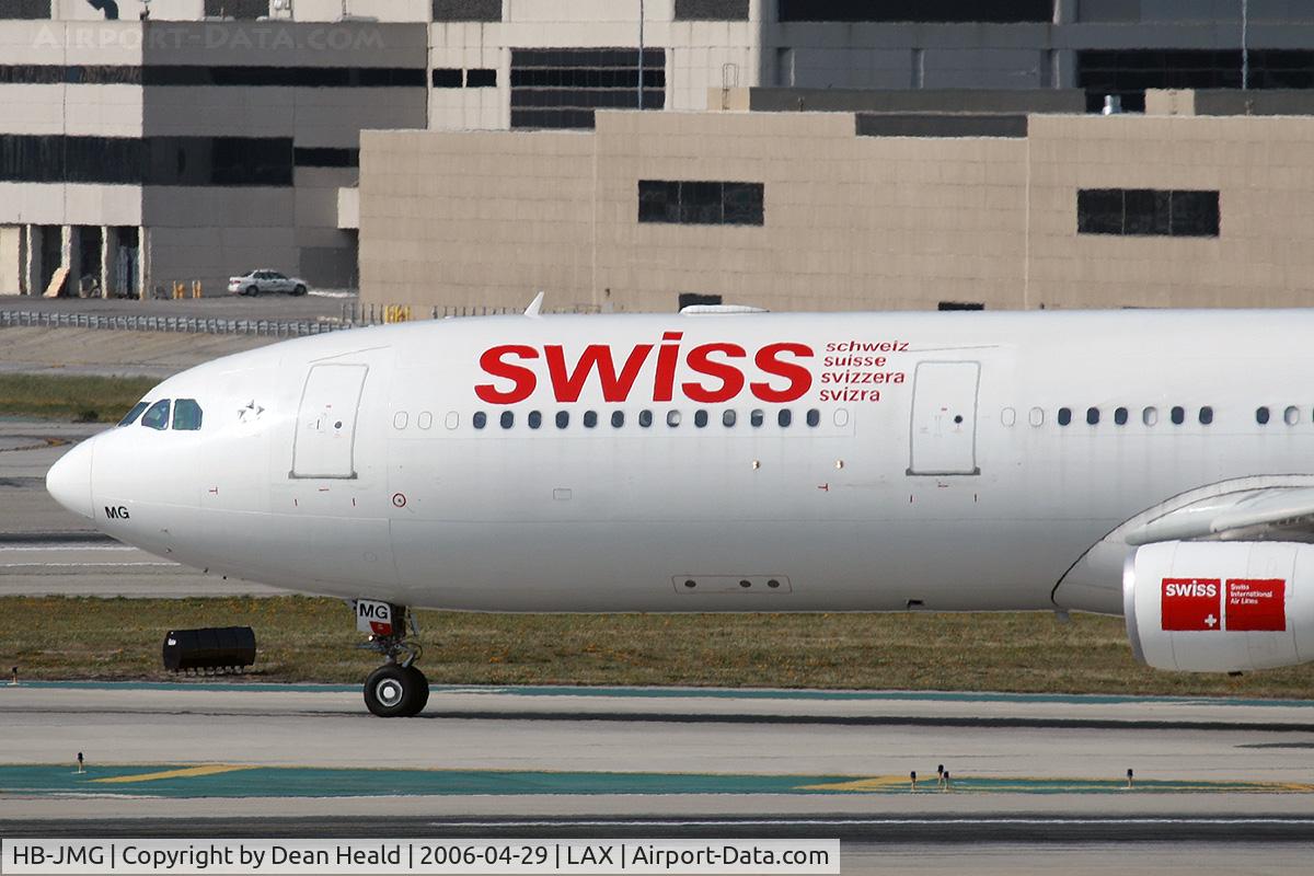 HB-JMG, 2003 Airbus A340-313 C/N 562, Close-up of Swiss International Airlines HB-JMG (FLT SWR40) on Taxiway Tango after arrival from Zurich (LSZH), Switzerland.