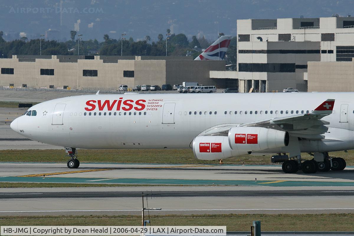 HB-JMG, 2003 Airbus A340-313 C/N 562, Close-up of Swiss International Airlines HB-JMG (FLT SWR40) on Taxiway Tango after arrival from Zurich (LSZH), Switzerland.