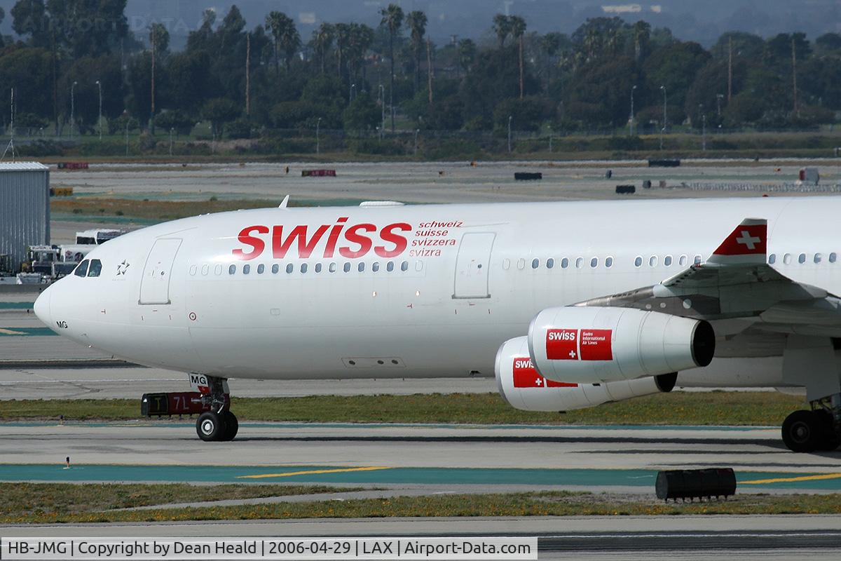 HB-JMG, 2003 Airbus A340-313 C/N 562, Close-up of Swiss International Airlines HB-JMG (FLT SWR40) on Taxiway Tango after arrival from Zurich (LSZH), Switzerland.