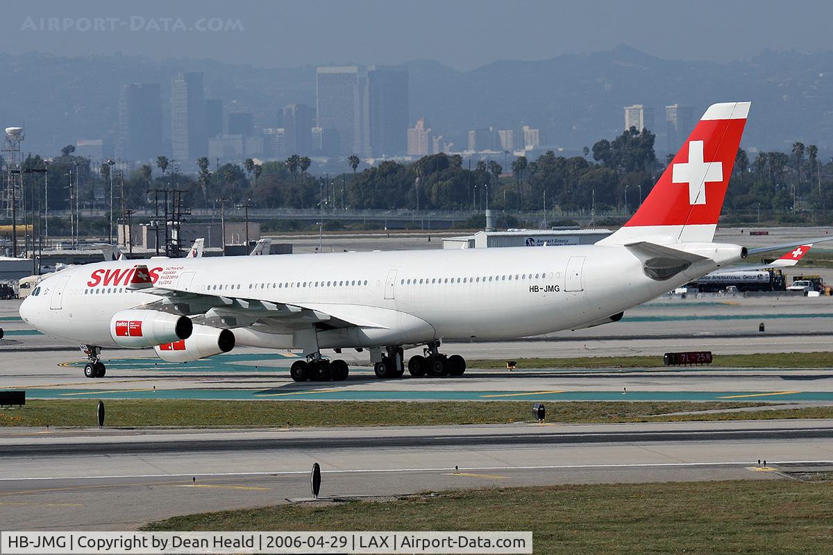 HB-JMG, 2003 Airbus A340-313 C/N 562, Swiss International Airlines HB-JMG (FLT SWR40) on Taxiway Tango, about to cross RWY 25R, after arrival from Zurich (LSZH), Switzerland on RWY 25L.