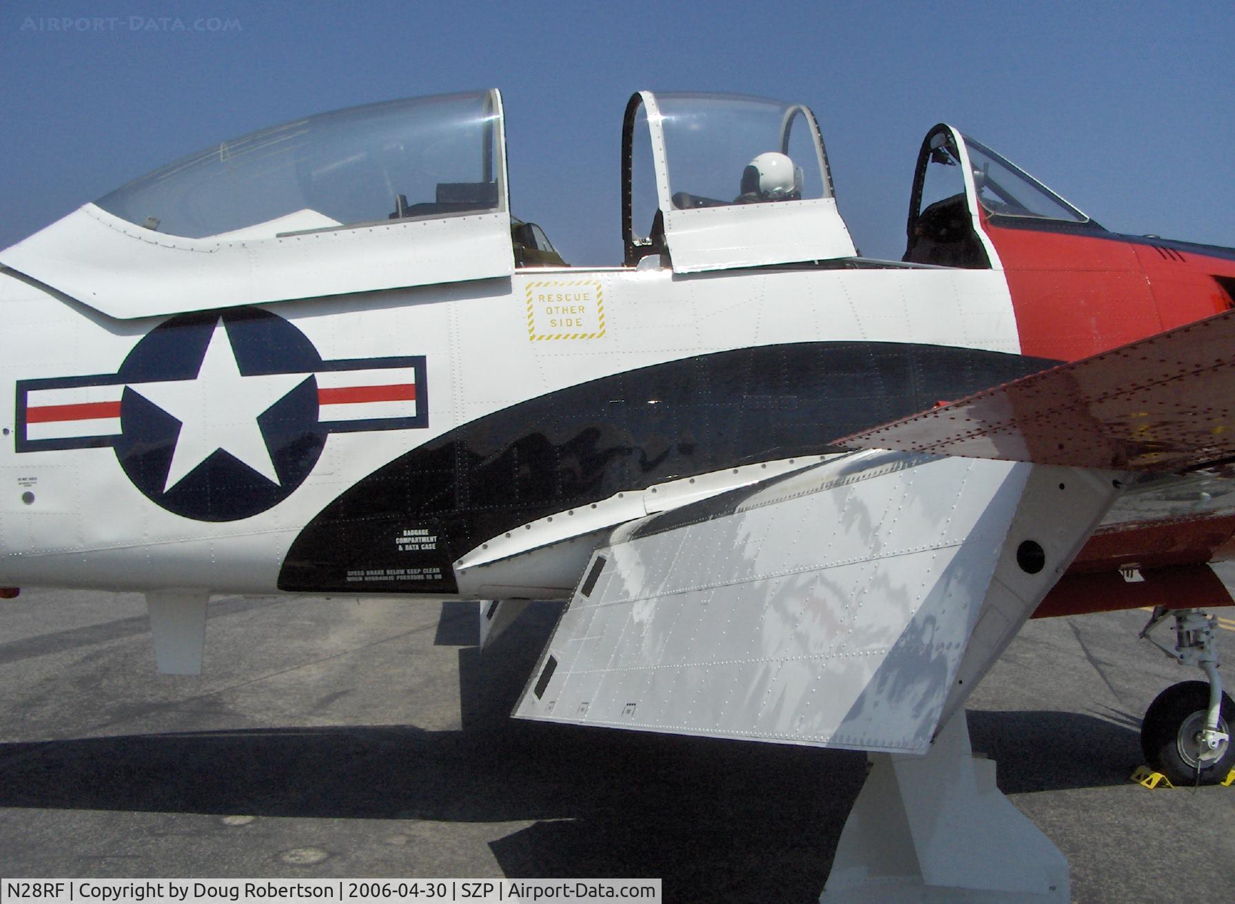 N28RF, 1954 North American T-28B Trojan C/N 200-193, North American T-28B TROJAN, Wright Cyclone R-1820-86 9 cylinder radial 1,425 Hp, dual cockpits, huge flaps extended, underfuselage air brake retracted