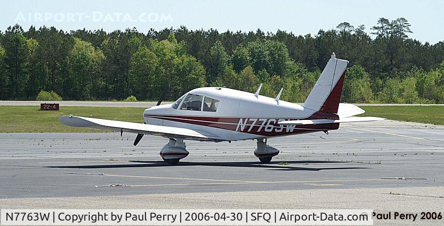 N7763W, 1964 Piper PA-28-180 Cherokee C/N 28-1762, Parked at the edge of the apron
