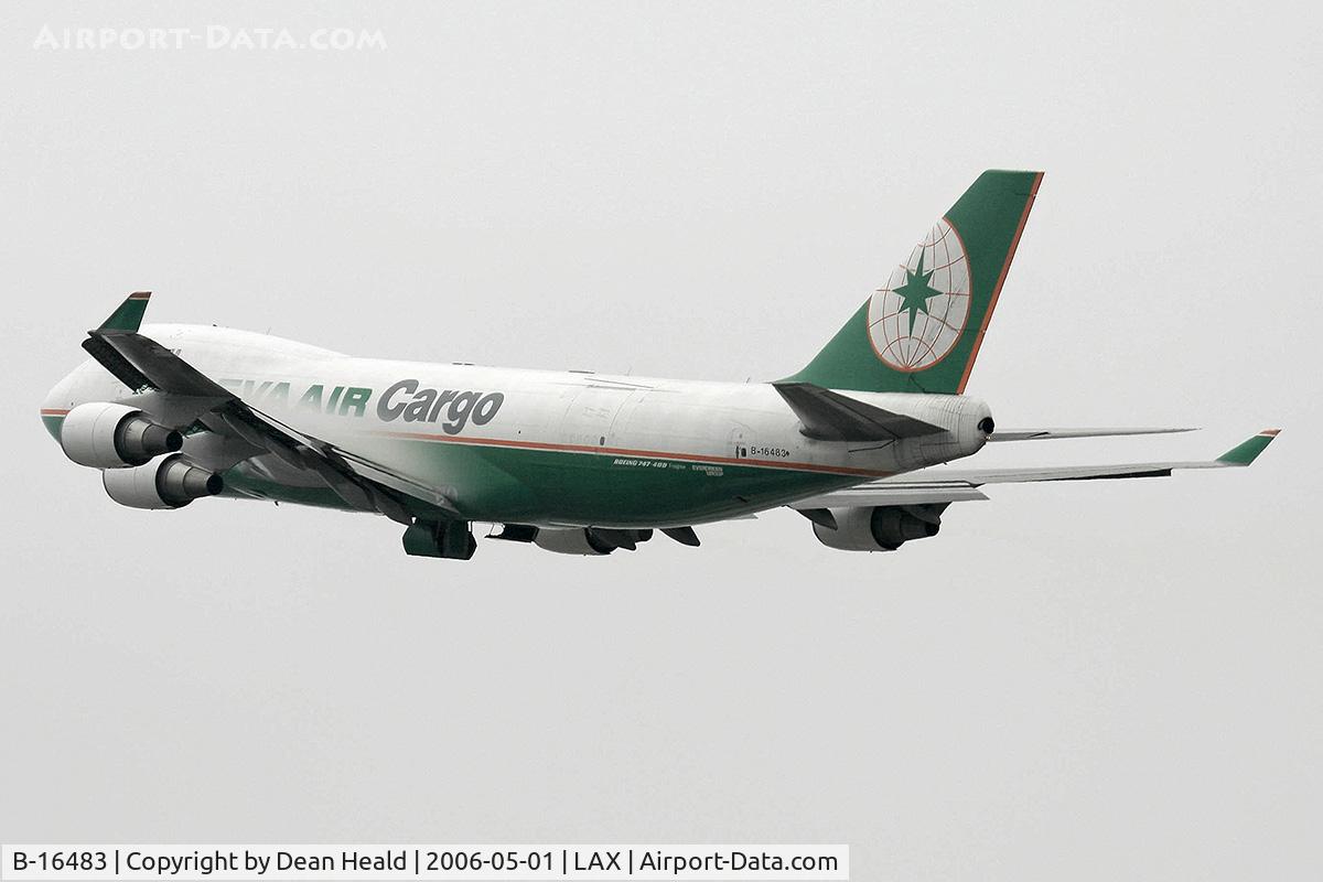 B-16483, 2002 Boeing 747-45EF (SCD) C/N 30609, EVA Air Cargo B-16483 (FLT EVA607) climbing out from LAX RWY 25L (on a foggy, overcast day), enroute to Chiang Kai Shek International Airport (RCTP) - Taipei, Taiwan.  Note the condensation on the upper surface of left wing.