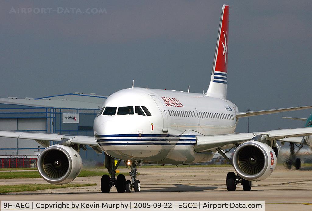 9H-AEG, 2003 Airbus A319-112 C/N 2113, Arriving at the threshold of 24L.