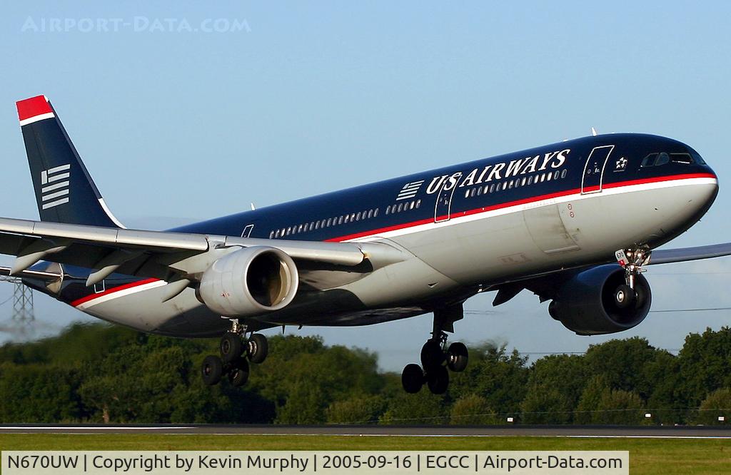 N670UW, 2000 Airbus A330-323 C/N 315, Black Beauty touching down on 06R.