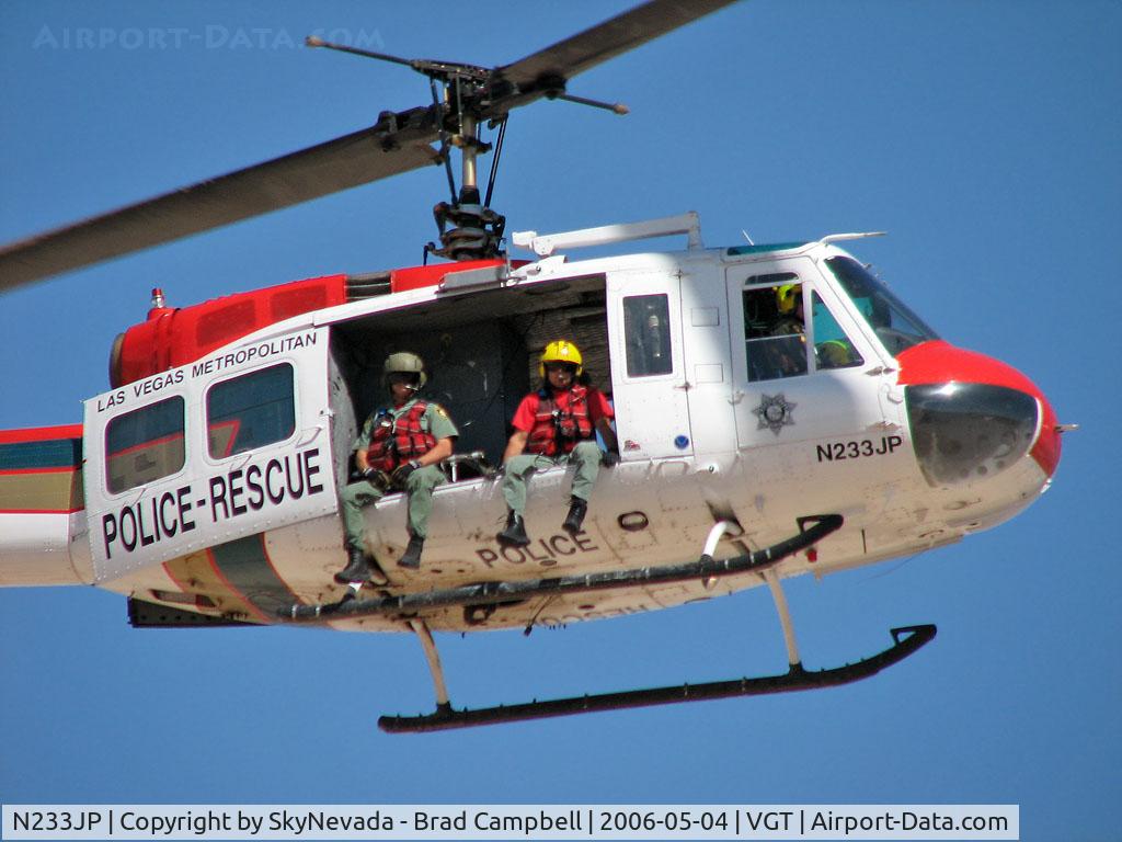 N233JP, Bell HH-1H C/N 17122, LVMPD /  Bell HH-1H - They don't look like they're very happy about the picture.