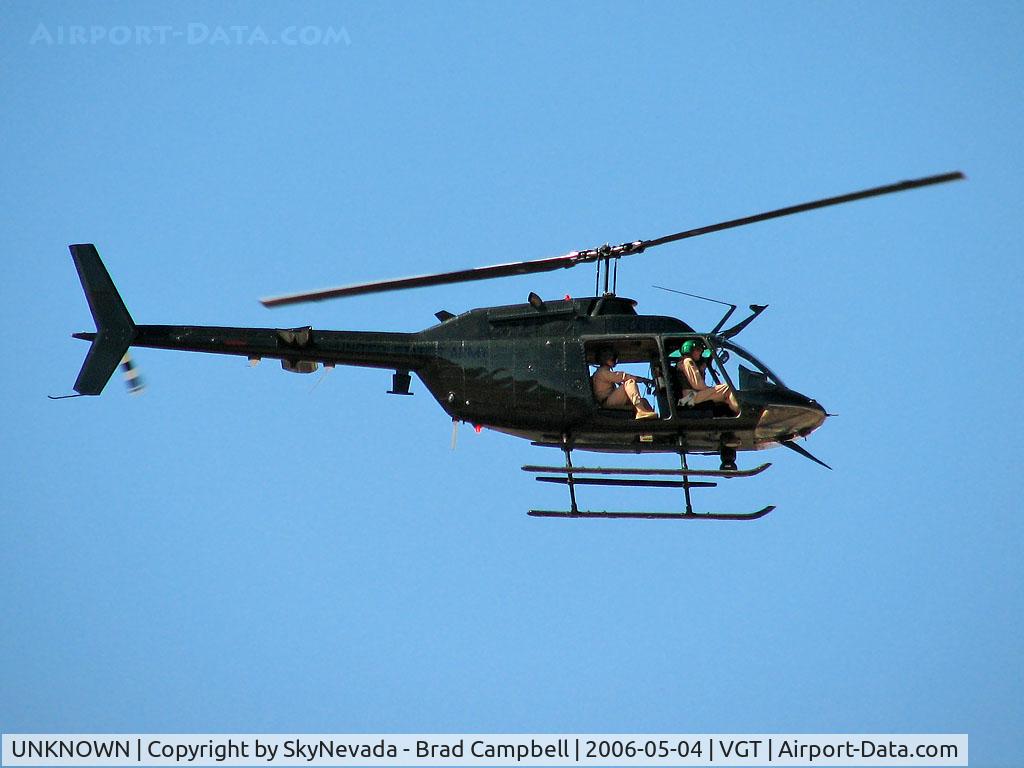 UNKNOWN, Helicopters Various C/N unknown, All I can tell is that it says 'ARMY' on the side. They people inside have the same clothing with patches on their sleeves.