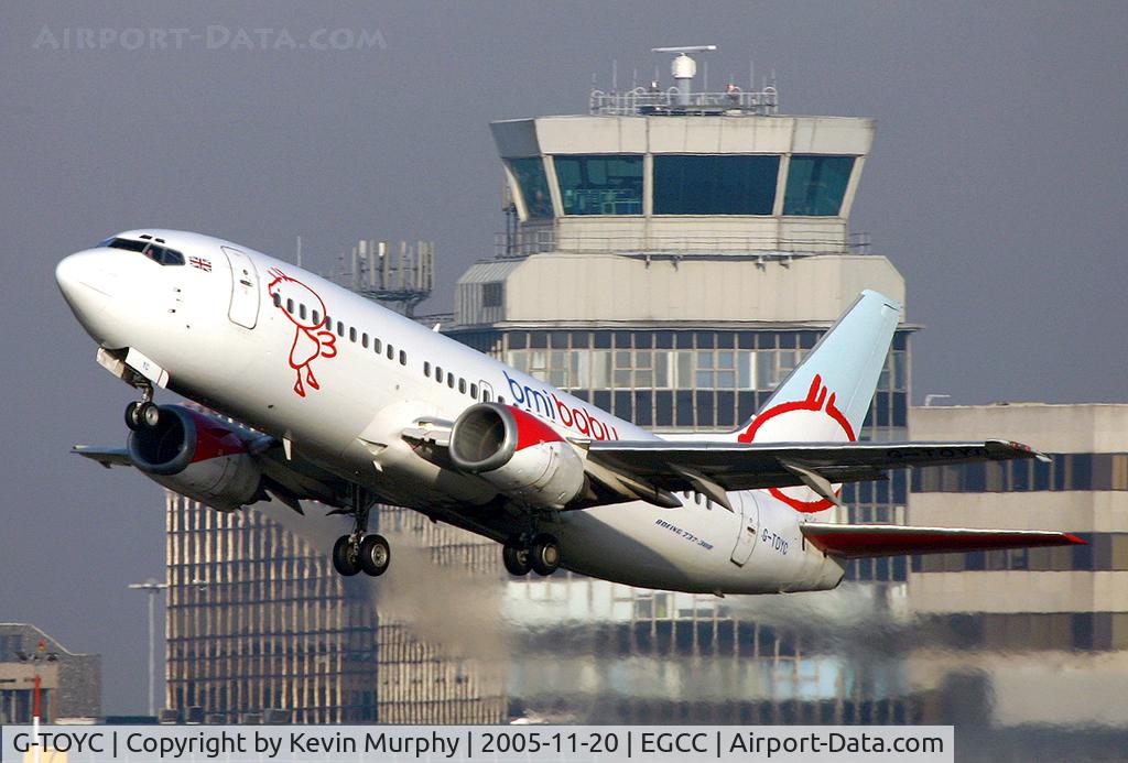 G-TOYC, 1995 Boeing 737-3Q8 C/N 26312, Passing Manchester ATC tower.