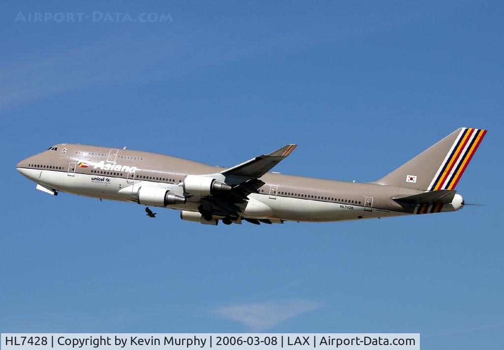 HL7428, 1998 Boeing 747-48E C/N 28552, An Eagle tries to keep up, the 747 won.