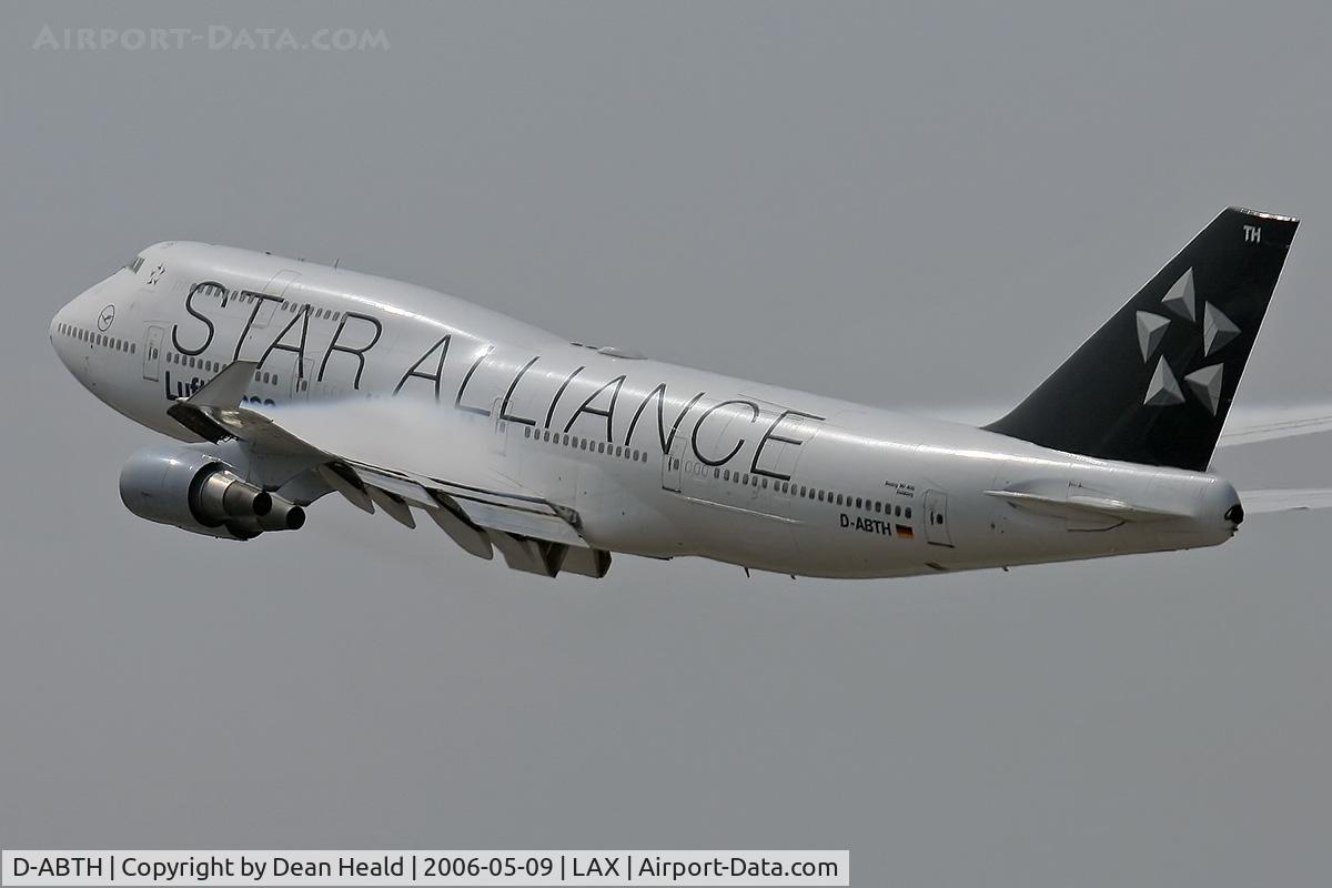 D-ABTH, 1991 Boeing 747-430M C/N 25047, Lufthansa (Star Alliance) D-ABTH (FLT DLH457) climbing out from LAX RWY 25R enroute to Frankfurt Main (EDDF), Germany with condensation visible on the upper surface of the wings.