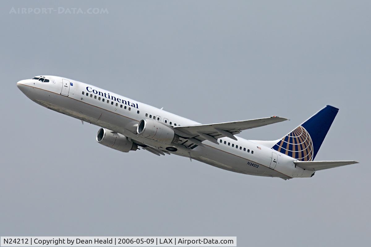 N24212, 1998 Boeing 737-824 C/N 28772, Continental Airlines N24212 (FLT COA594) climbing out from RWY 25R enroute to George Bush Intercontinental Airport (KIAH) - Houston, Texas.