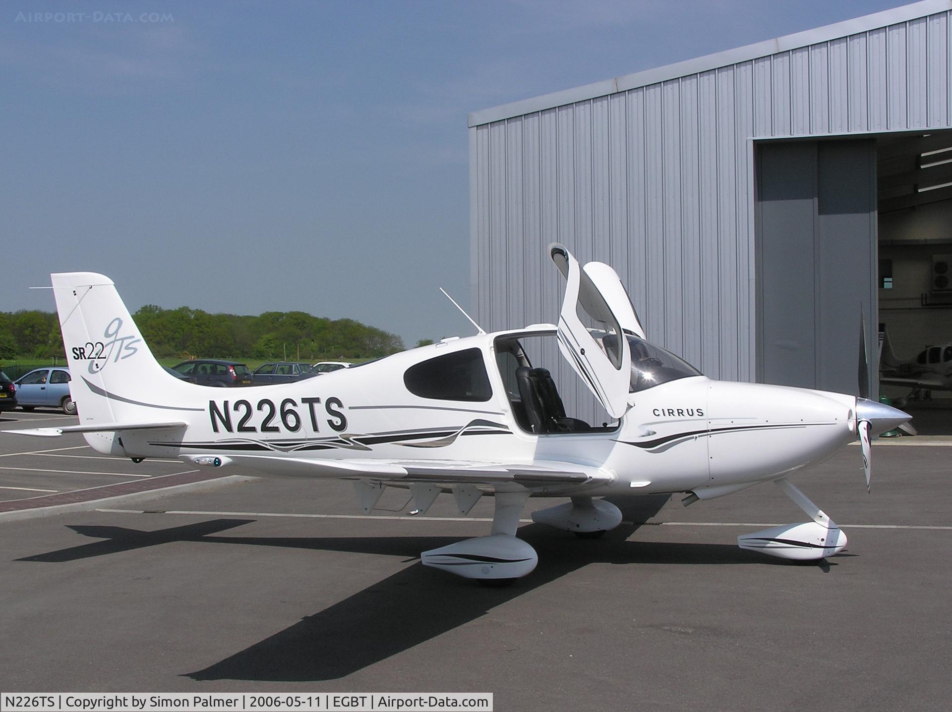 N226TS, 2005 Cirrus SR22 GTS C/N 1548, Cirrus with doors open parked by the hangar