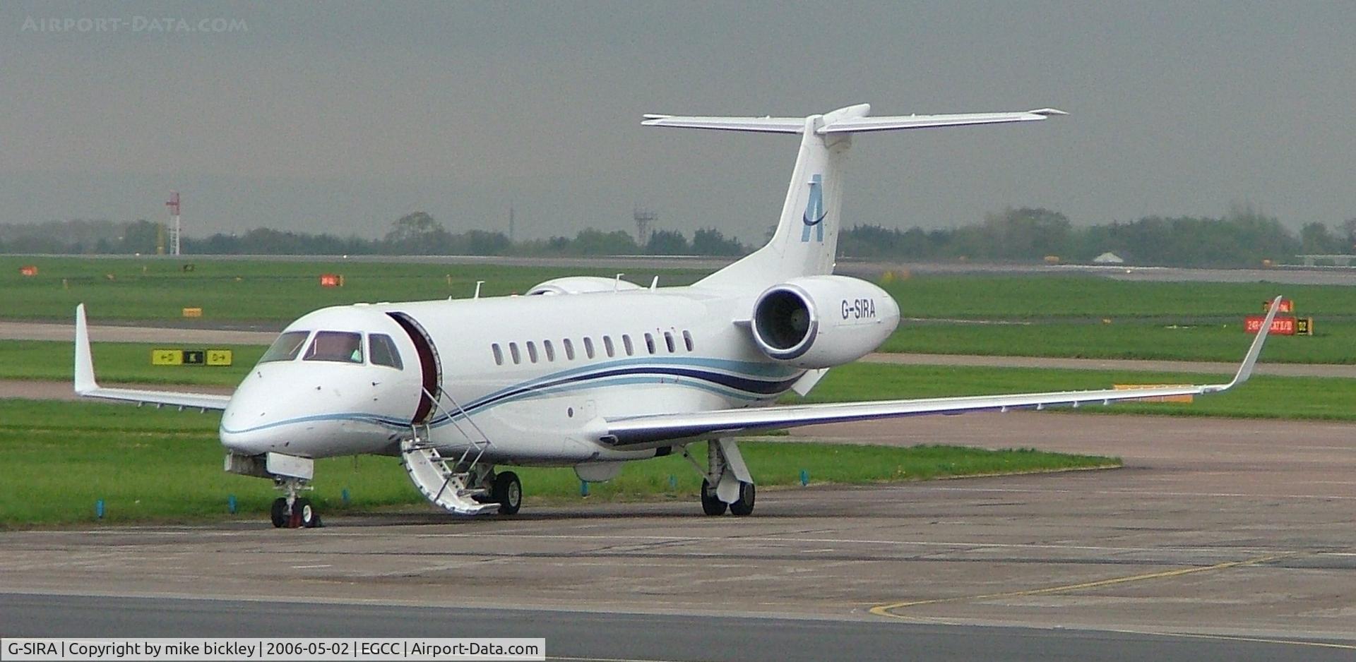 G-SIRA, 2004 Embraer EMB-135BJ Legacy C/N 14500832, door left open - and it rained heavily all day !