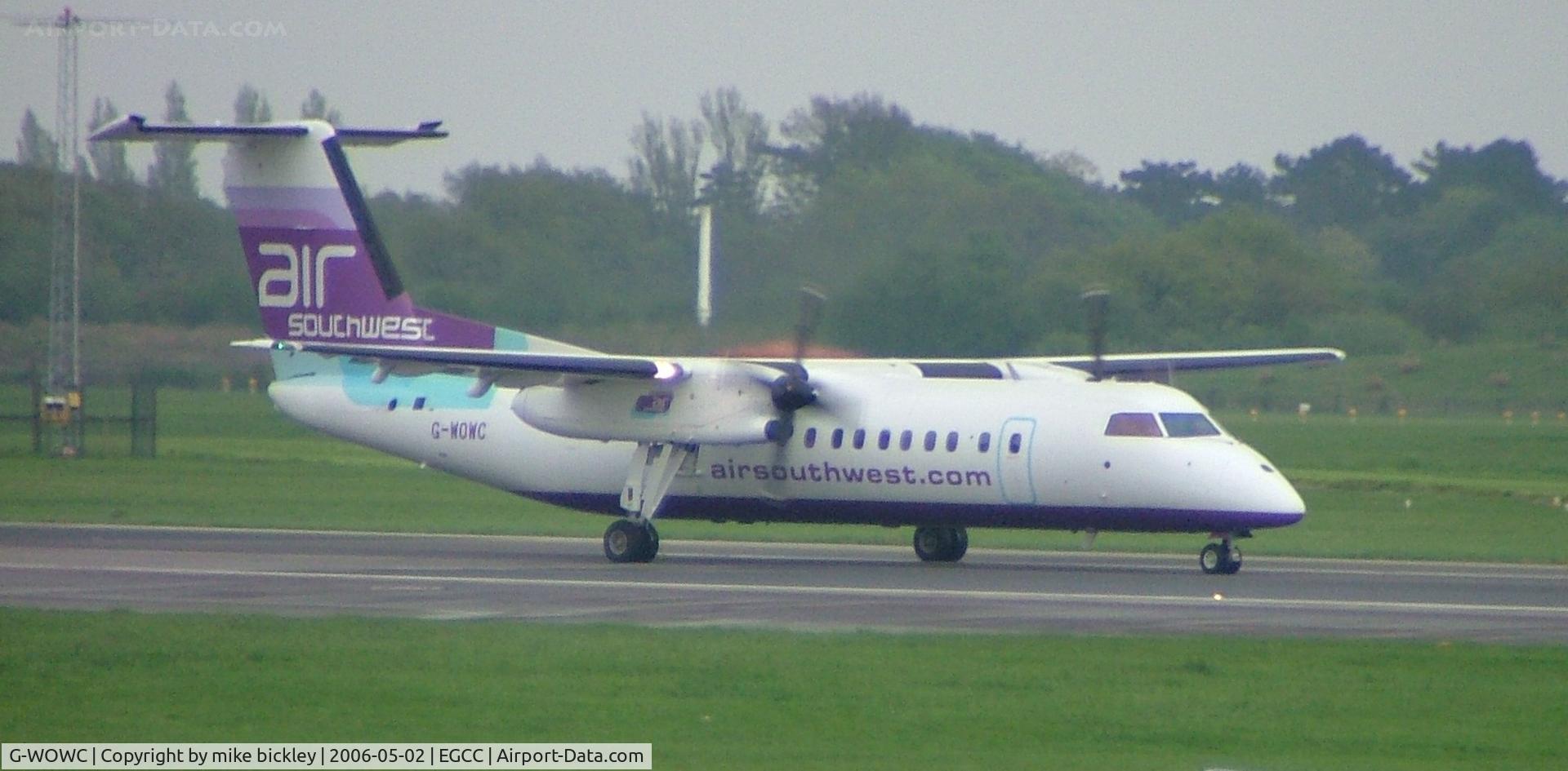 G-WOWC, 1991 De Havilland Canada DHC-8-311 Dash 8 C/N 311, taken in heavy rain - sorry for poor quality
