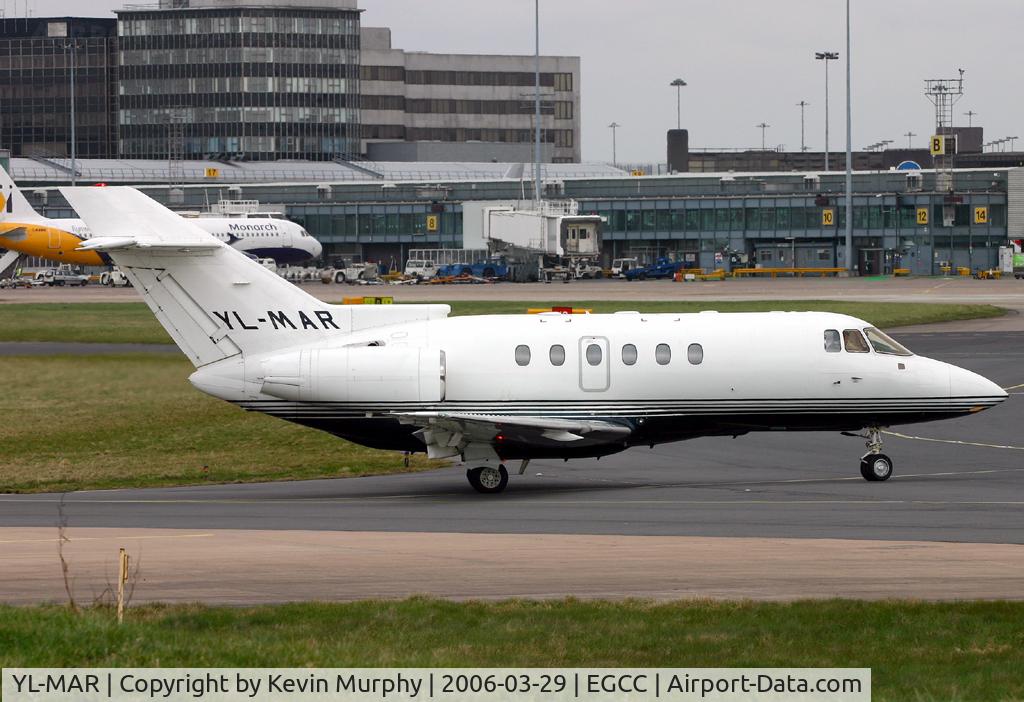 YL-MAR, 1998 Raytheon Hawker 800XP C/N 258389, Slipping out of the business ramp.