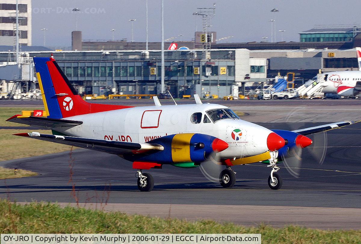 OY-JRO, 1968 Beech B90 King Air C/N LJ-327, A very small little freighter leaving the exec ramp.