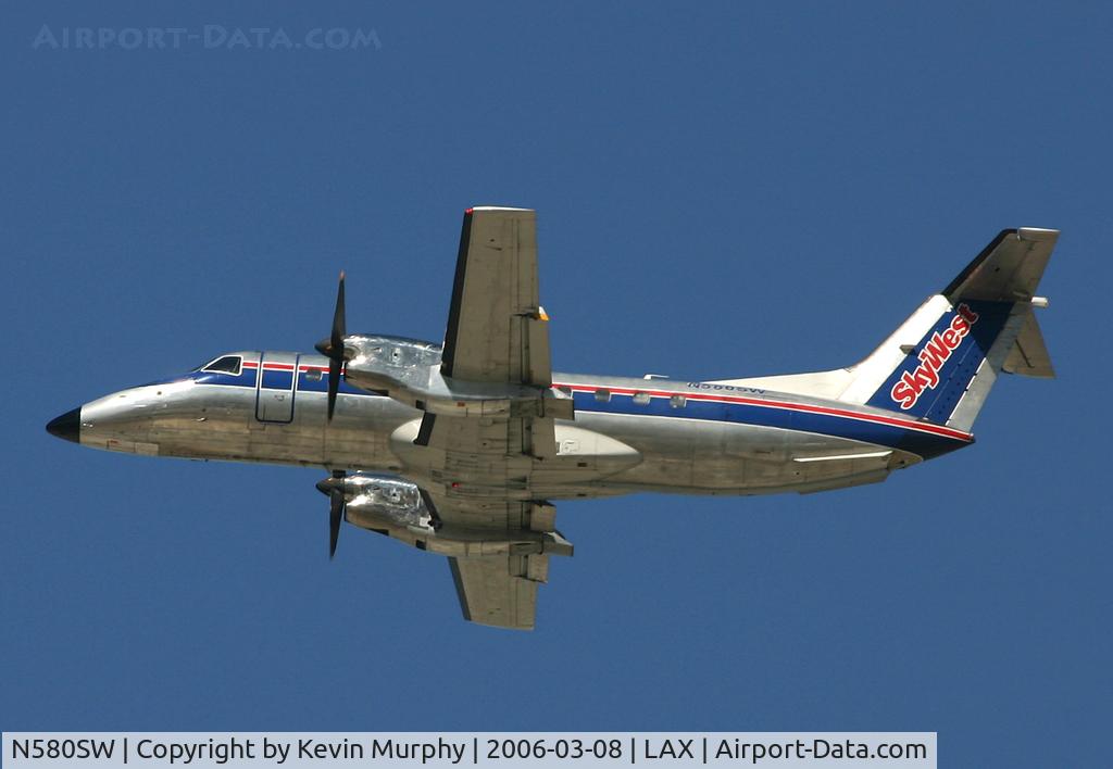 N580SW, 1999 Embraer EMB-120ER Brasilia C/N 120348, Nice prop leaving Los Angeles.
