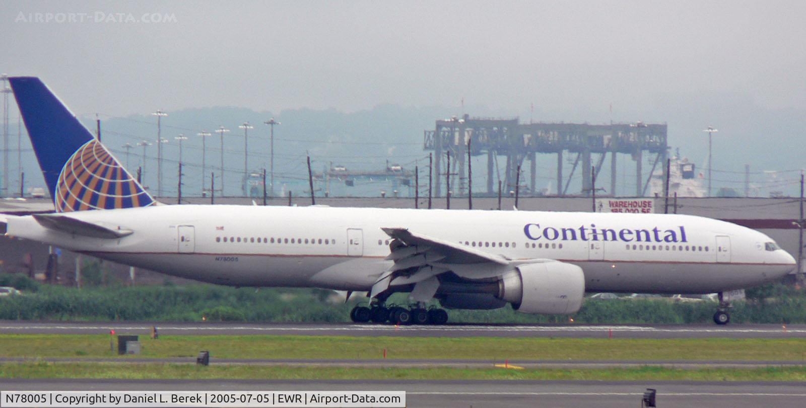 N78005, 1998 Boeing 777-224 C/N 27581, Two mighty GE GE90 engines bring this leviathin aircraft to a halt after a long-haul flight.