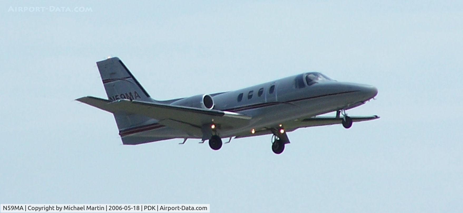 N59MA, 1977 Cessna 501 Citation I/SP C/N 501-0050, Departing PDK - Starting to rotate gear.