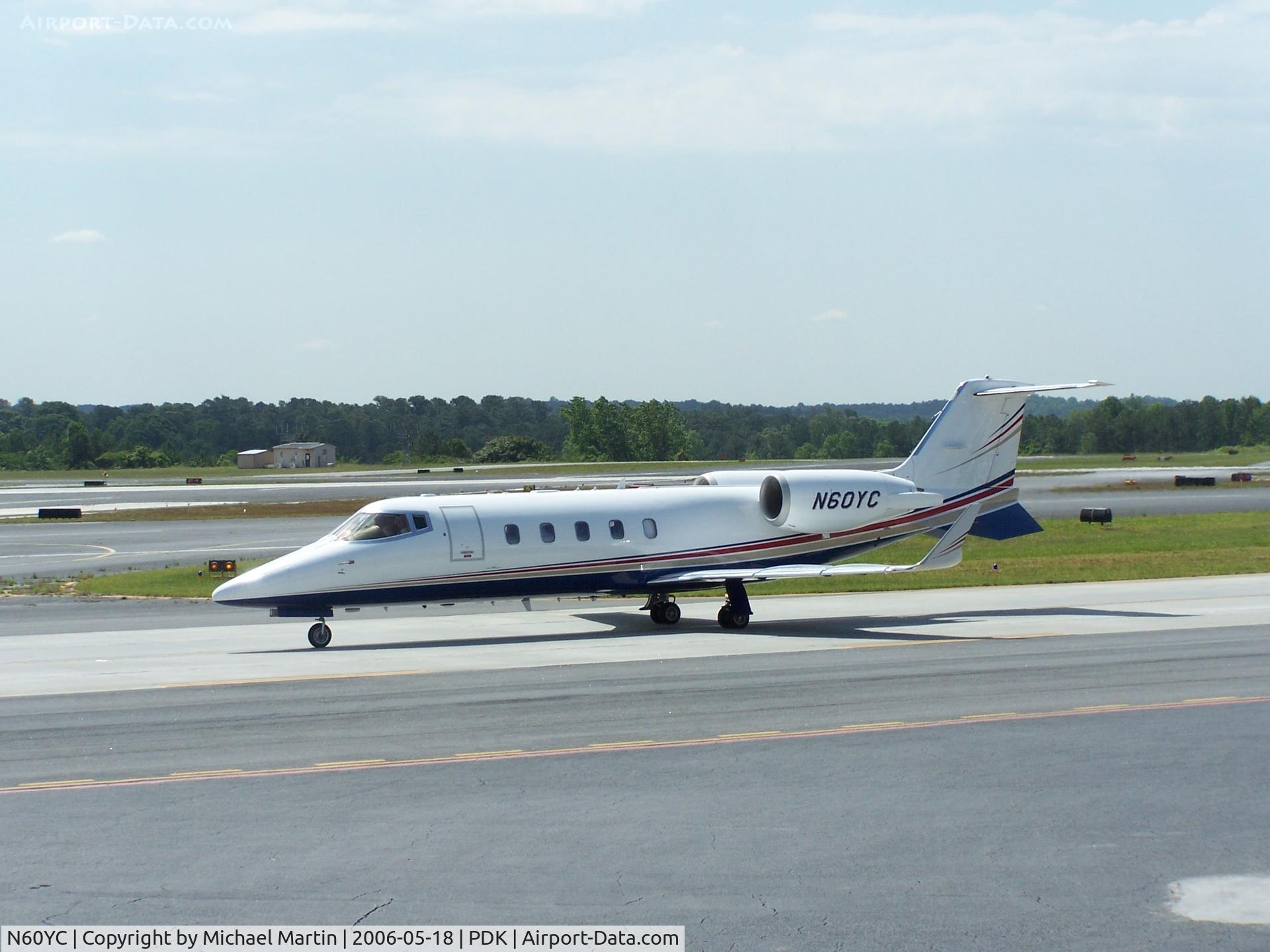 N60YC, 2003 Learjet 60 C/N 267, Taxing to Epps Air Service