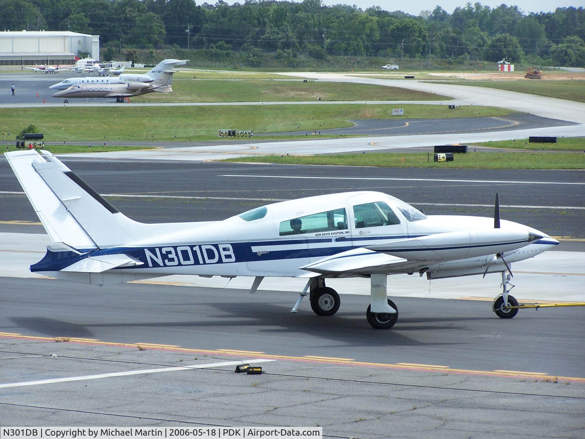 N301DB, 1977 Cessna 310R C/N 310R0891, Being towed to parking at Epps Air Service