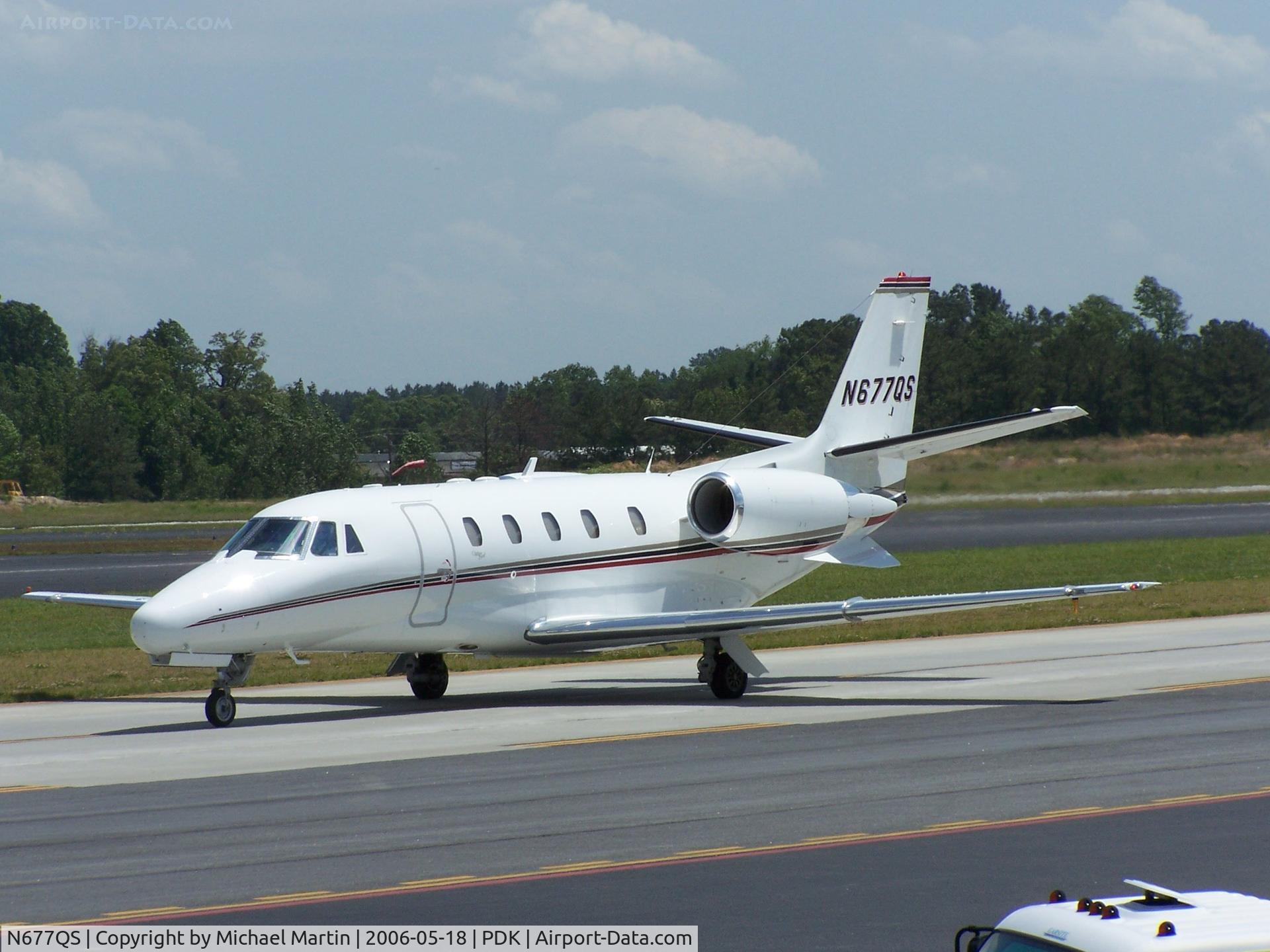 N677QS, 2004 Cessna 560XL C/N 560-5367, Taxing to Epps Air Service