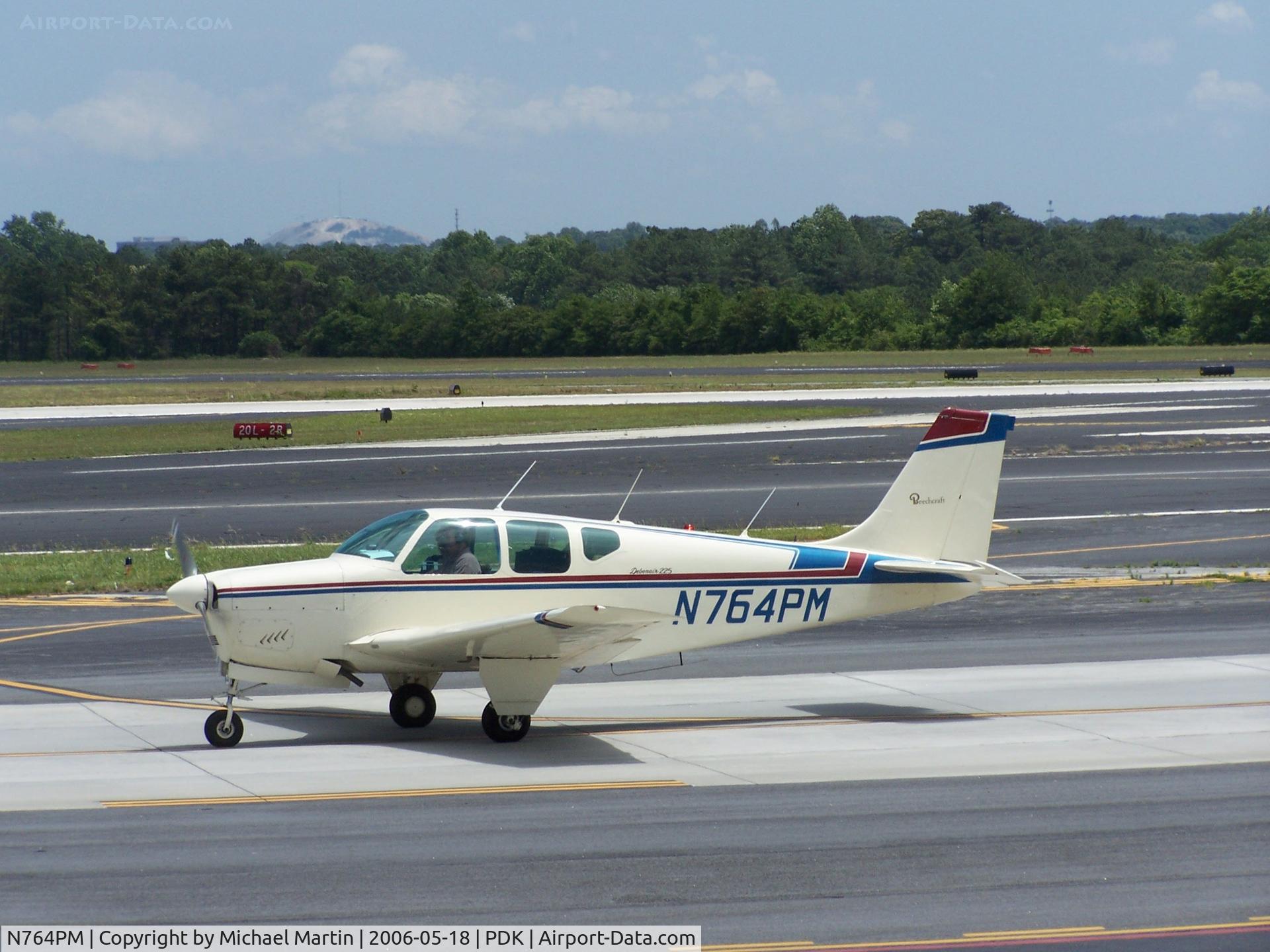 N764PM, 1960 Beech 35-33 Debonair C/N CD-58, Taxing to 20R