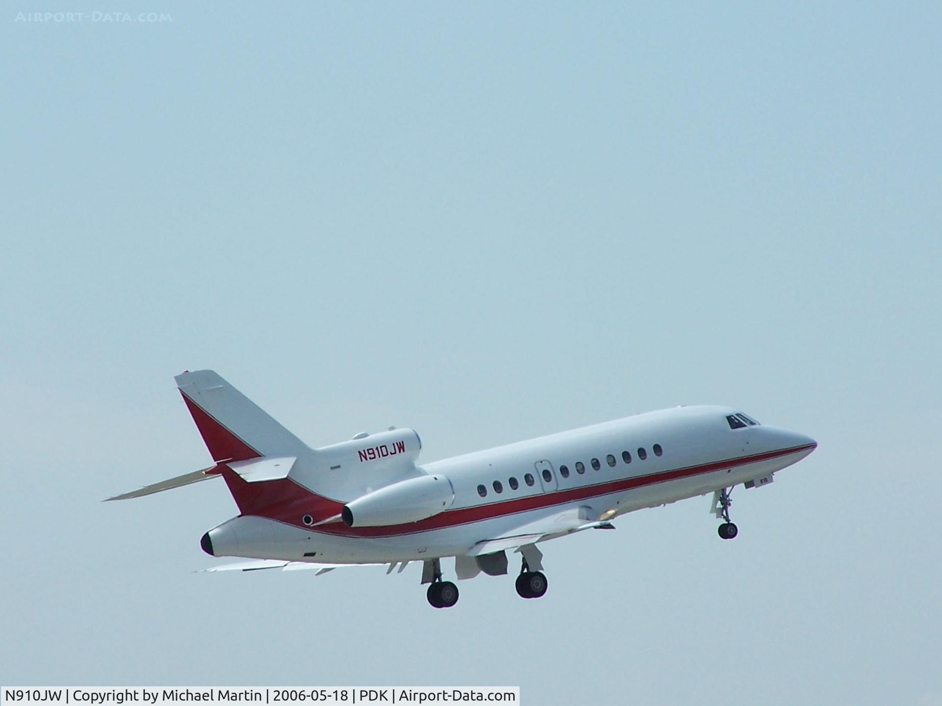 N910JW, 1987 Dassault Falcon 900 C/N 31, Departing 20L - Gear Up!
