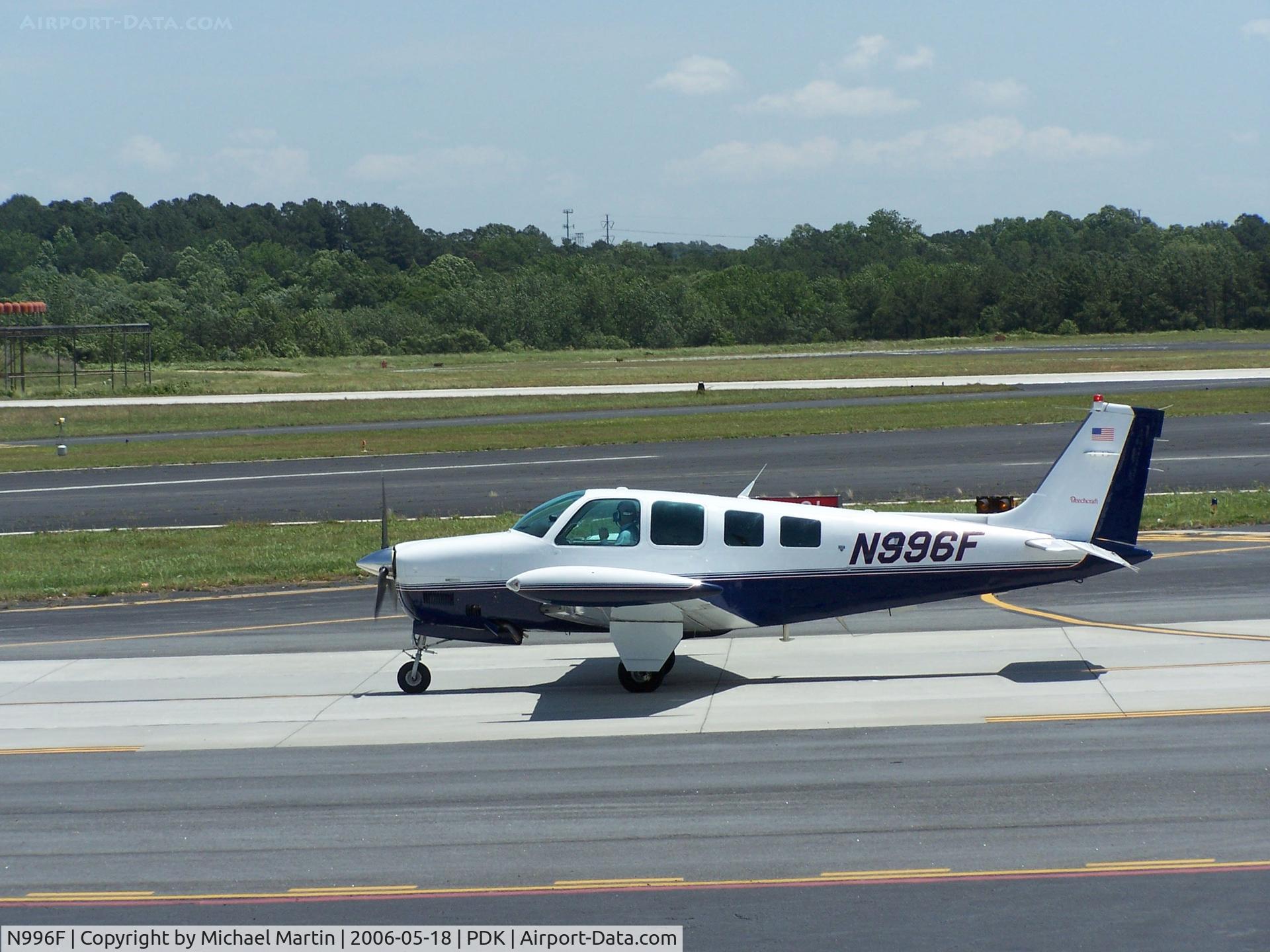 N996F, 1996 Raytheon Aircraft Company A36 Bonanza C/N E-3042, TAXING TO 2R