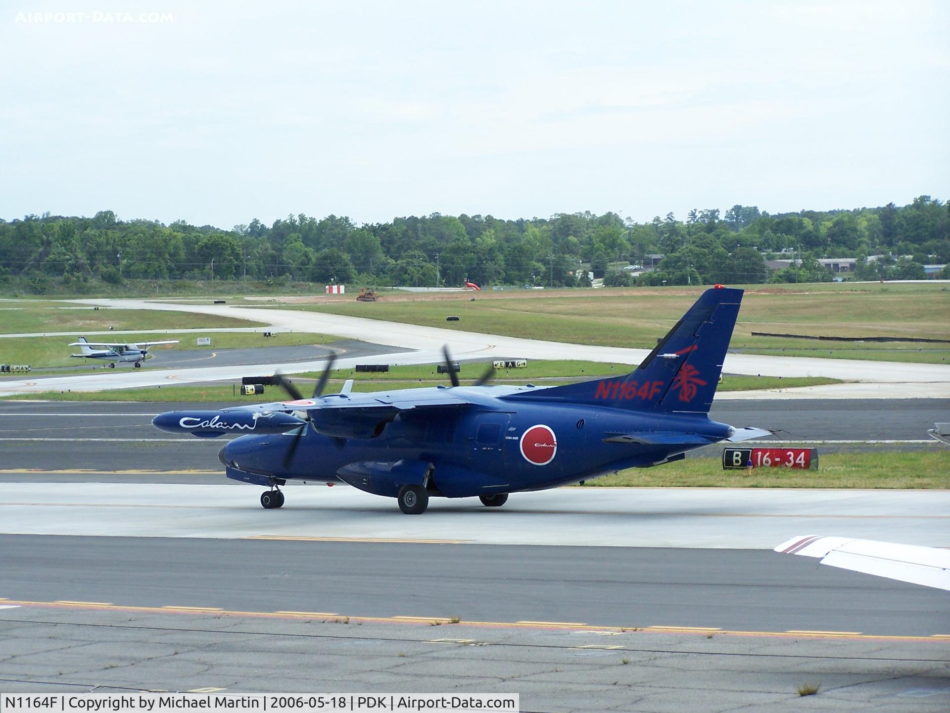 N1164F, Mitsubishi MU-2B-60 Marquise C/N 1562SA, Taxing to Epps Air Service