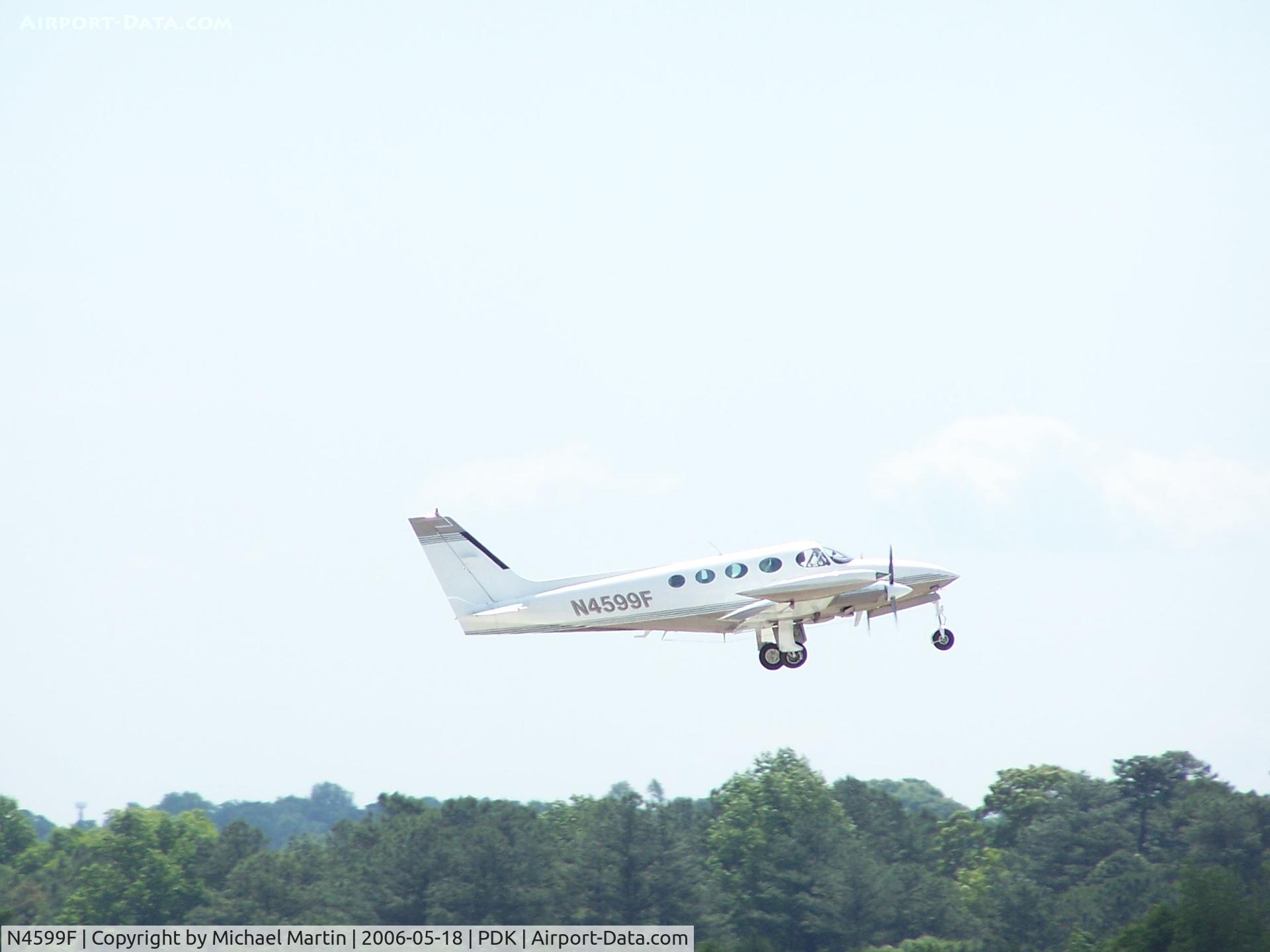 N4599F, 1979 Cessna 340A C/N 340A0652, Departing 20L - Gear Up!