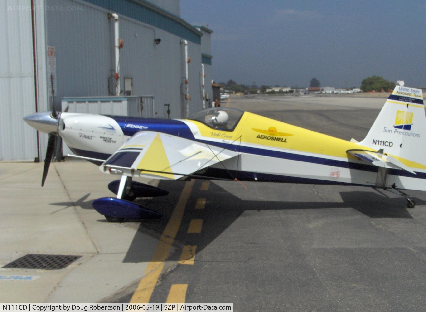 N111CD, 1999 Zivko Edge 540 C/N 0026, 1999 Zivco EDGE 540, Lycoming AEIO-540 330 Hp, taxi to hangar, note visored helmet