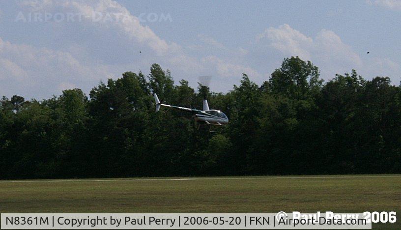 N8361M, 1996 Robinson R44 C/N 0303, And there she goes!