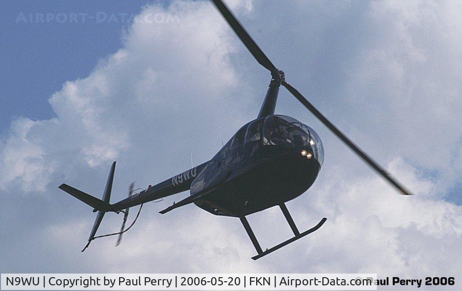N9WU, 2006 Robinson R44 Raven II C/N 11108, Late in the day, and a Black R-44 comes in