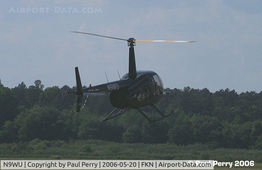 N9WU, 2006 Robinson R44 Raven II C/N 11108, Bit of a flare, then touchdown after a brief pivot