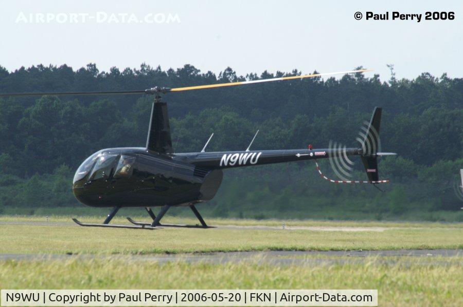 N9WU, 2006 Robinson R44 Raven II C/N 11108, Here you can see the upper surface of the main rotor is striped