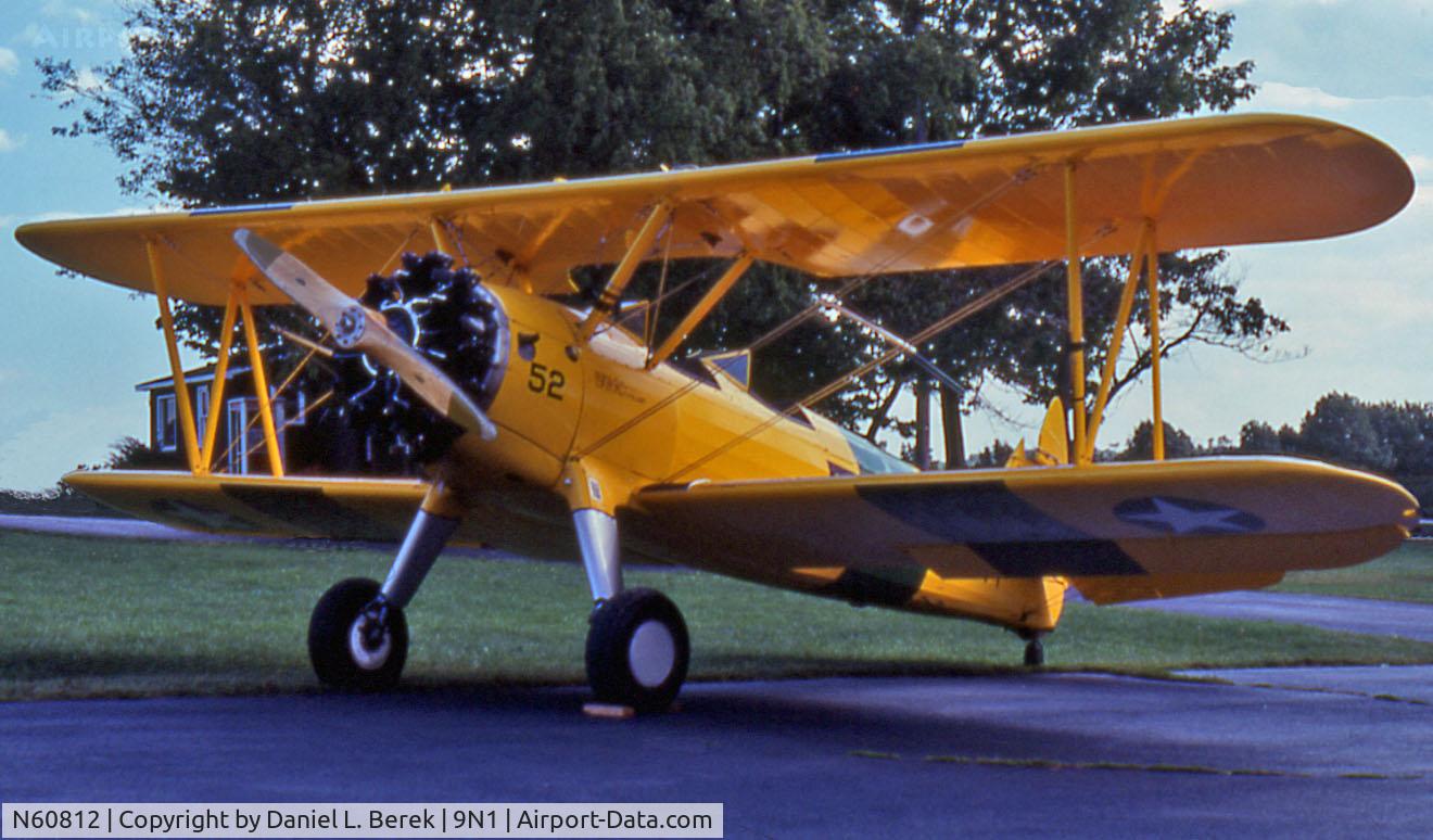 N60812, 1941 Boeing A75N1(PT17) C/N 75-3783, This beautiful yellow Stearman has several brethren for company at Vansant Airport, Erwinna, PA.