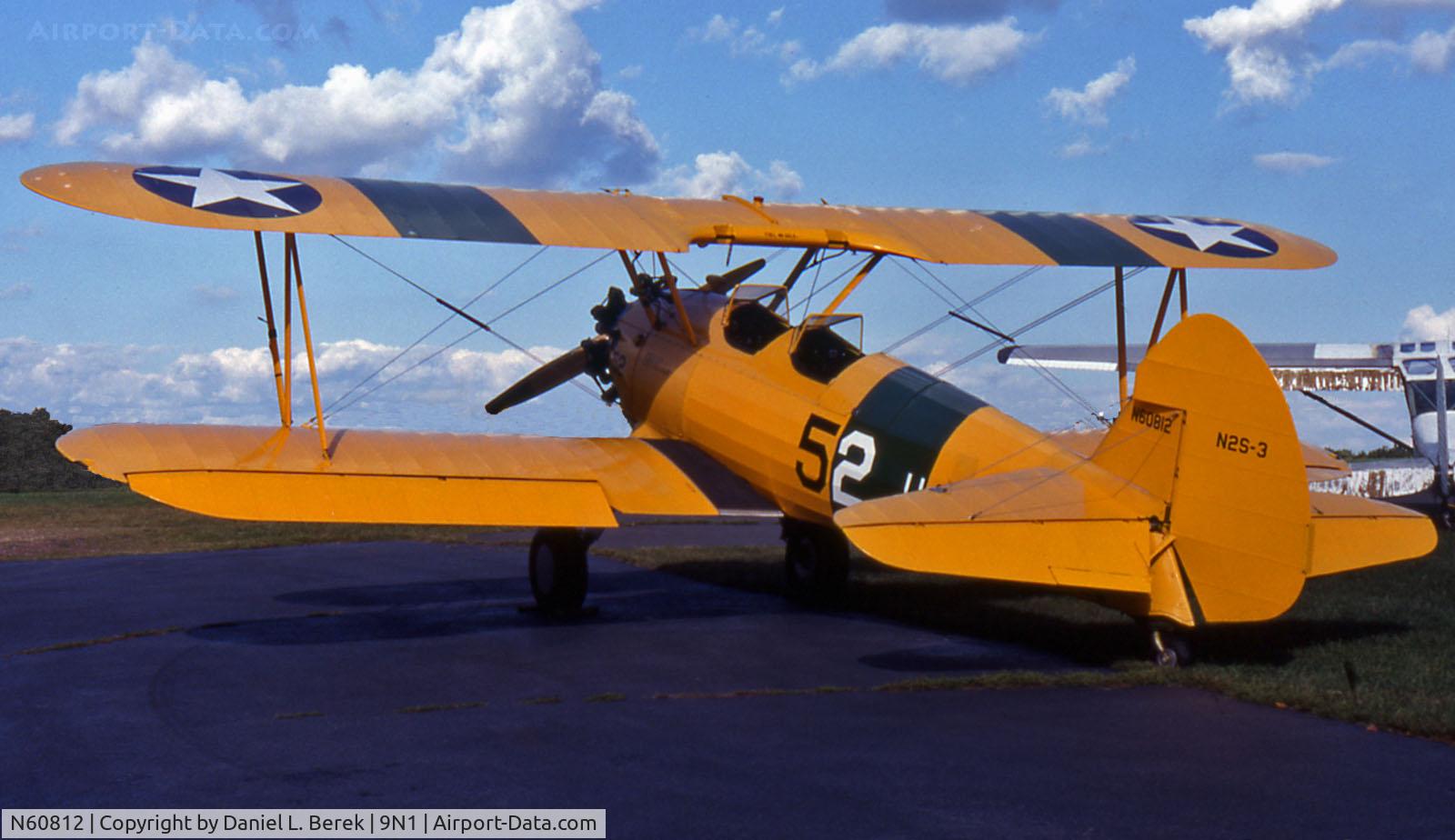 N60812, 1941 Boeing A75N1(PT17) C/N 75-3783, This beautiful yellow Stearman has several brethren for company at Vansant Airport, Erwinna, PA.