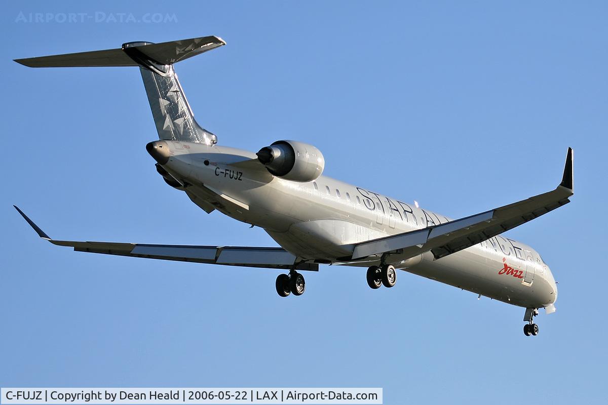 C-FUJZ, 2005 Bombardier CRJ-900 C/N 15048, Air Canada Jazz C-FUJZ in Star Alliance colors (FLT JZA8529) from Edmonton Int'l (KYEG) on final approach to RWY 24R.