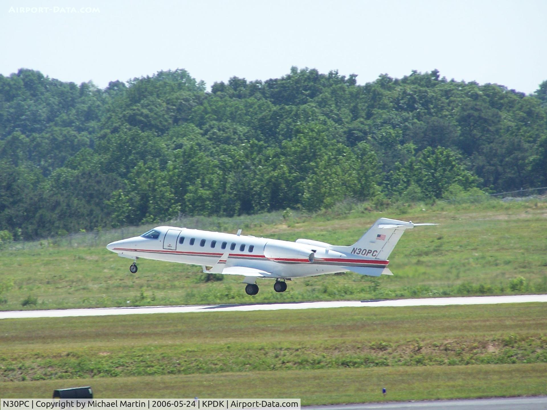 N30PC, 2003 Learjet 45 C/N 235, Departing on 2R