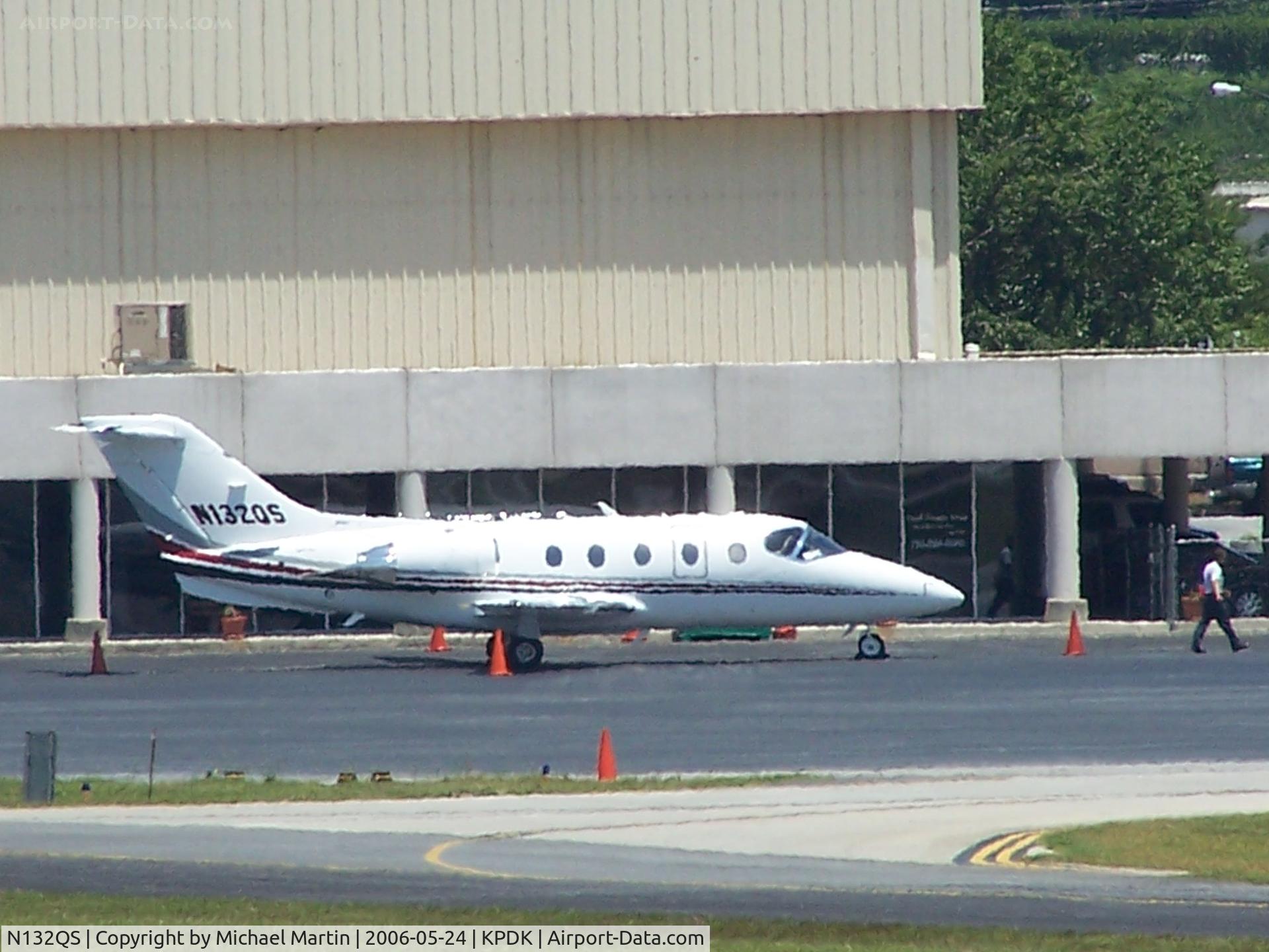 N132QS, Raytheon Aircraft Company 400A C/N RK-427, Tied down @ Signature Flight Services (Long range photo - pardon image)