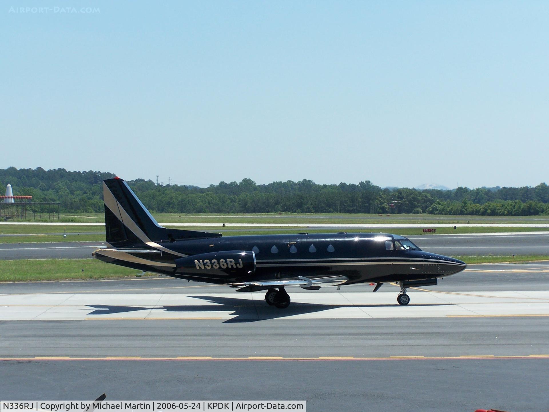 N336RJ, 1979 Rockwell International NA-265-65 Sabreliner 65 C/N 465-10, Taxing past Mercury Air Service