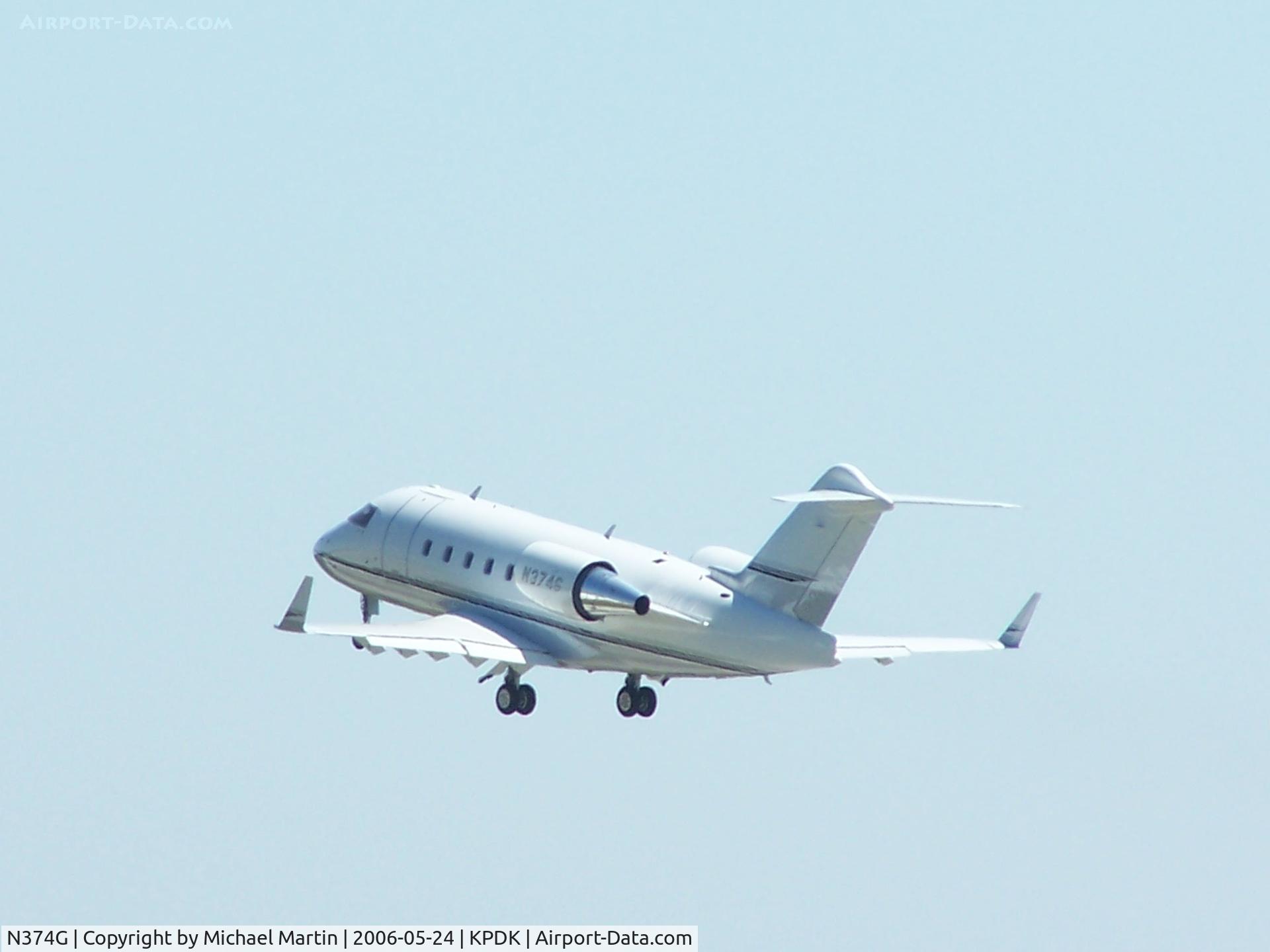 N374G, 2000 Canadair Challenger 604 (CL-600-2B16) C/N 5368, Departing on 2R to parts unknown