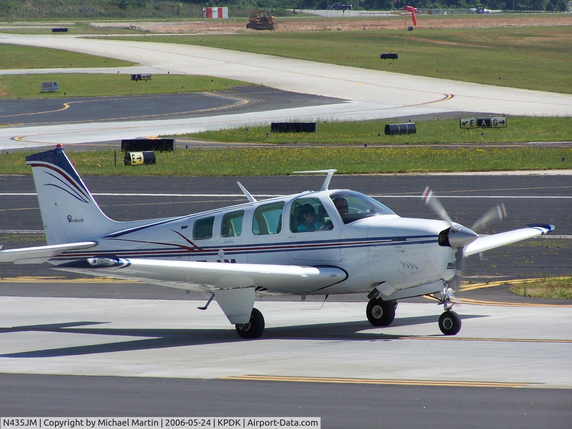N435JM, 1975 Beech A36 Bonanza 36 C/N E-762, Taxing to Runway 2L