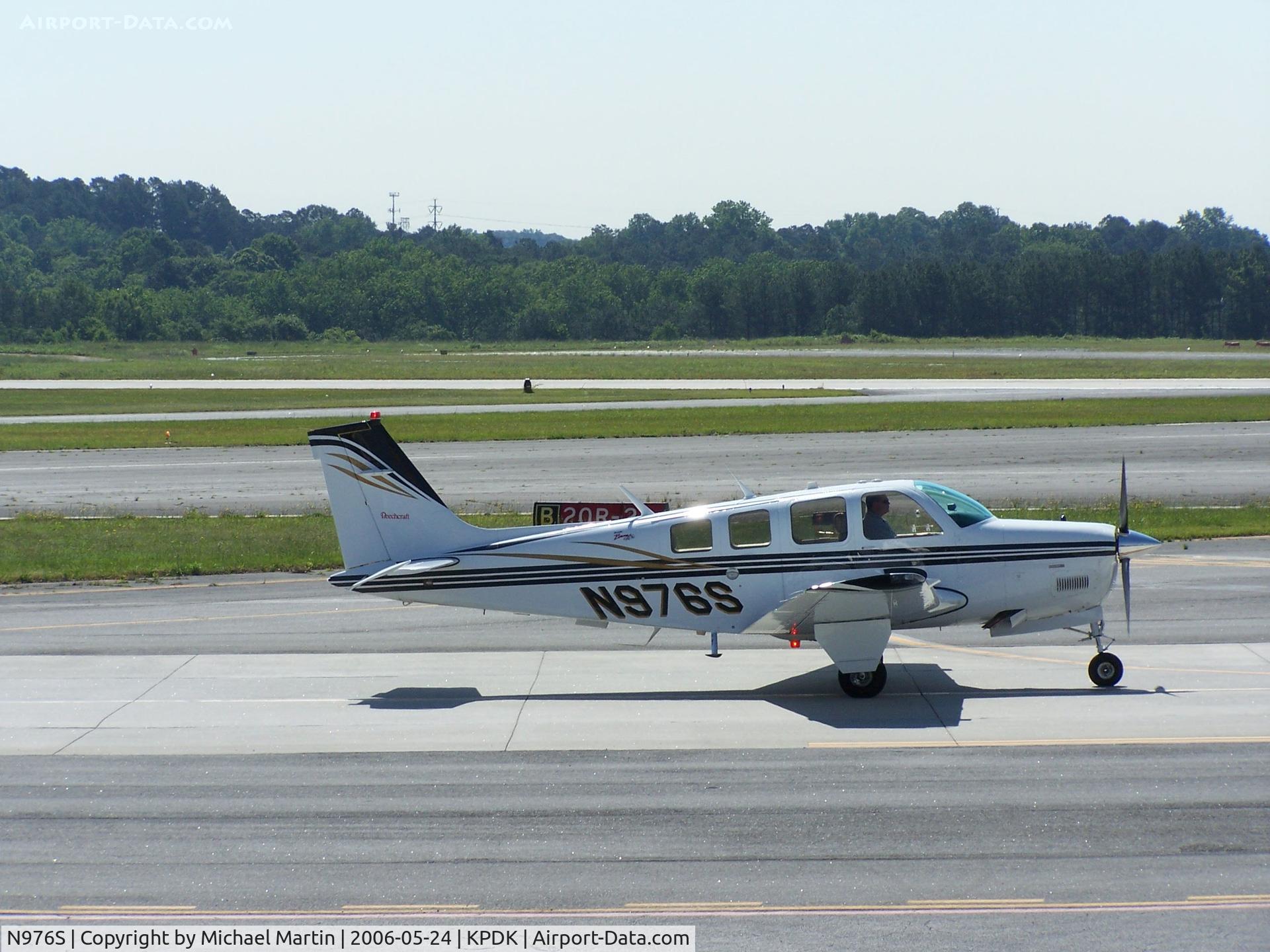 N976S, 2001 Raytheon Aircraft Company A36 Bonanza C/N E-3370, Taxing to Runway 2L