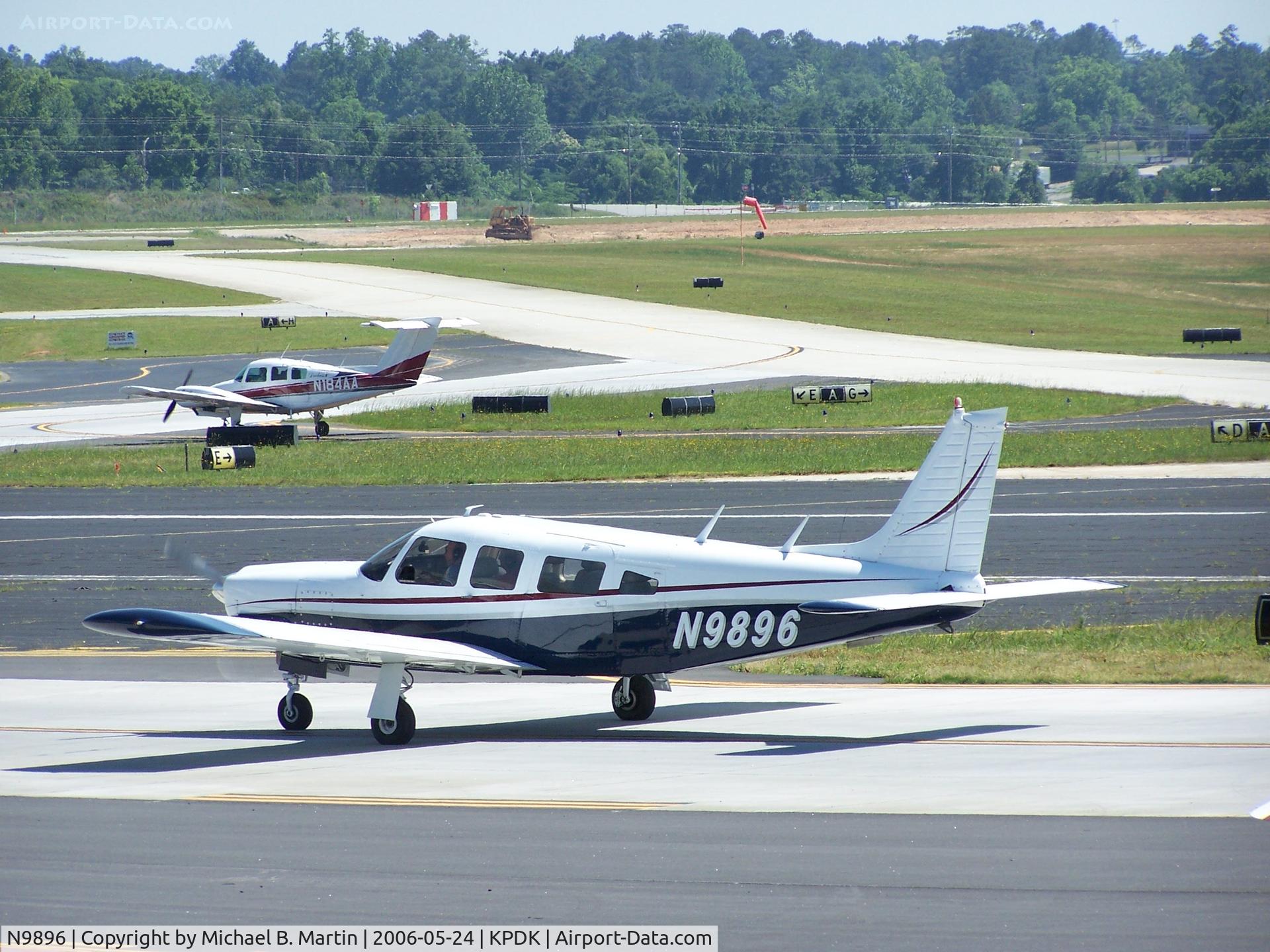 N9896, 1976 Piper PA-32R-300 Cherokee Lance C/N 32R-7680184, Taxing to tiedown