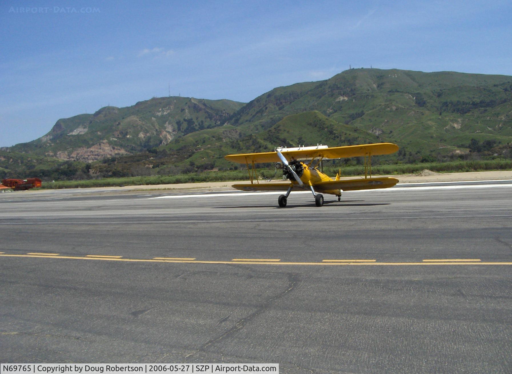 N69765, 1941 Boeing A75N1 (PT17) C/N 75-1044, 1941 Boeing Stearman A75N1, taxi turn off Runway 22